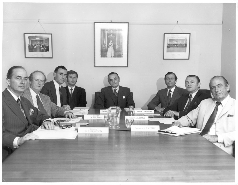 Standing Committee on Social Environment, 1972. L-R: Senators Gordon Davidson and Tony Mulvihill, Bob Thomson [Secretary] and Bill Symington [Research Officer], Senators Condor Laucke [Chair], James Webster, Jack Little and Jim Keeffe.