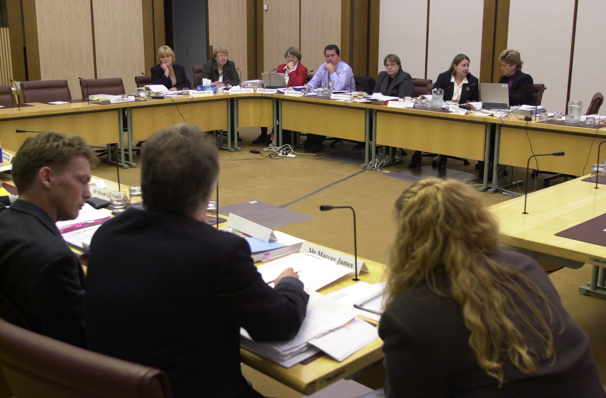 Community Affairs Legislation Committee members questioning officers of the Department of Health and Aged Care, 28 May 2001. Seated facing camera L-R: Senators Brenda Gibbs, Kay Denman, Sue West, Chris Evans and Trish Crossin, Christine McDonald [Acting Secretary] and Senator Sue Knowles [Chair]. DPS Auspic.