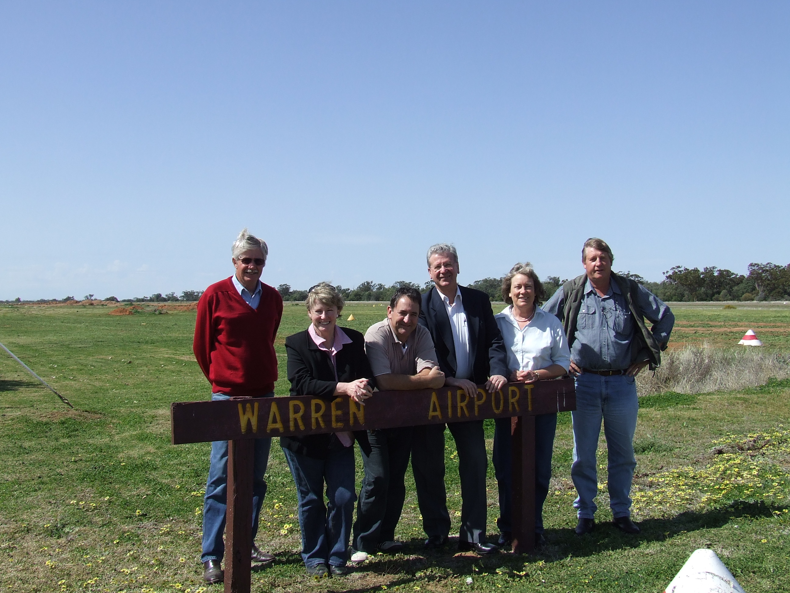 Members of the Standing Committee on Rural and Regional Affairs and Transport with officers from the Warren Shire Council at Warren airport during a visit to the town for the committee's inquiry into climate change and the Australian agricultural sector, 12 September 2008. L-R: Councillor Rex Wilson [Mayor, Warren Shire Council], Senators Christine Milne, Glenn Sterle and Kerry O'Brien, Dr Christine Jones and Ashley Wielinga [General Manager, Warren Shire Council].
