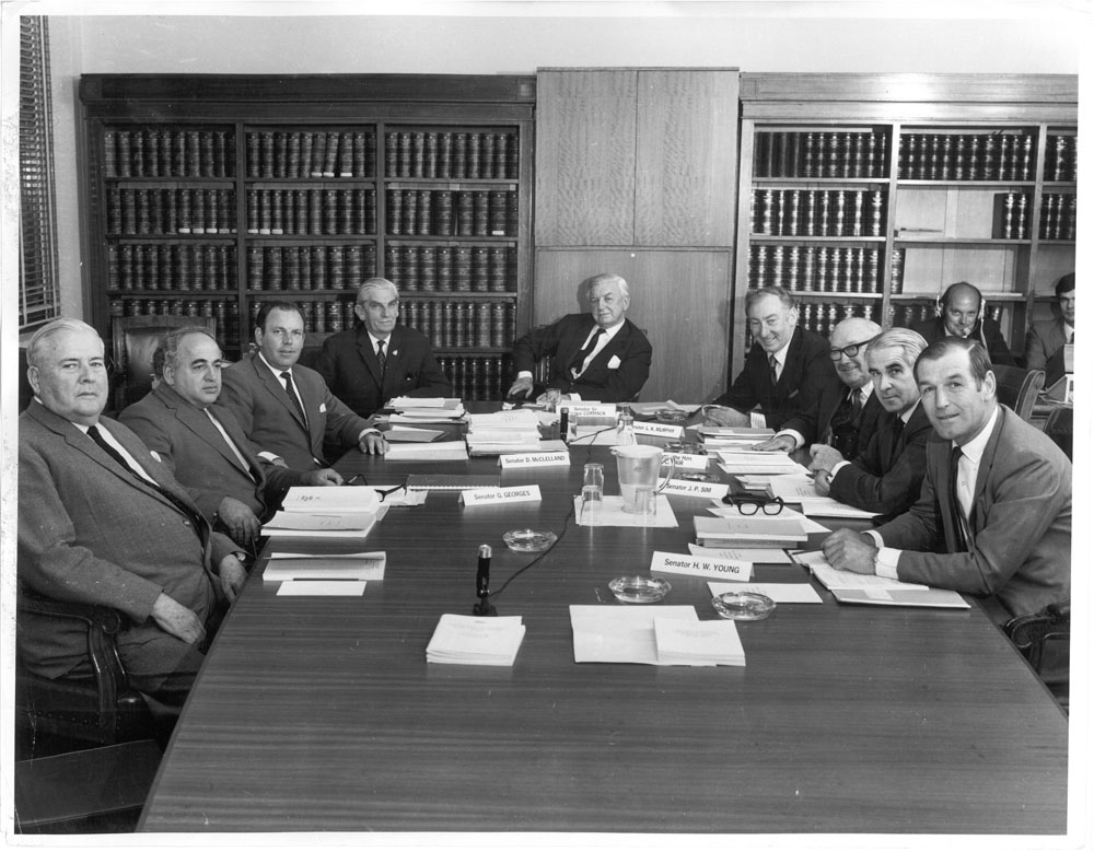 Estimates Committee A in public session, 17 September 1970. L-R: Senators Alister McMullin [President of the Senate], George Georges, Douglas McClelland, Kenneth Anderson, Magnus Cormack [Chair], Lionel Murphy, Vincent Gair, John Sim and Harold Young.
