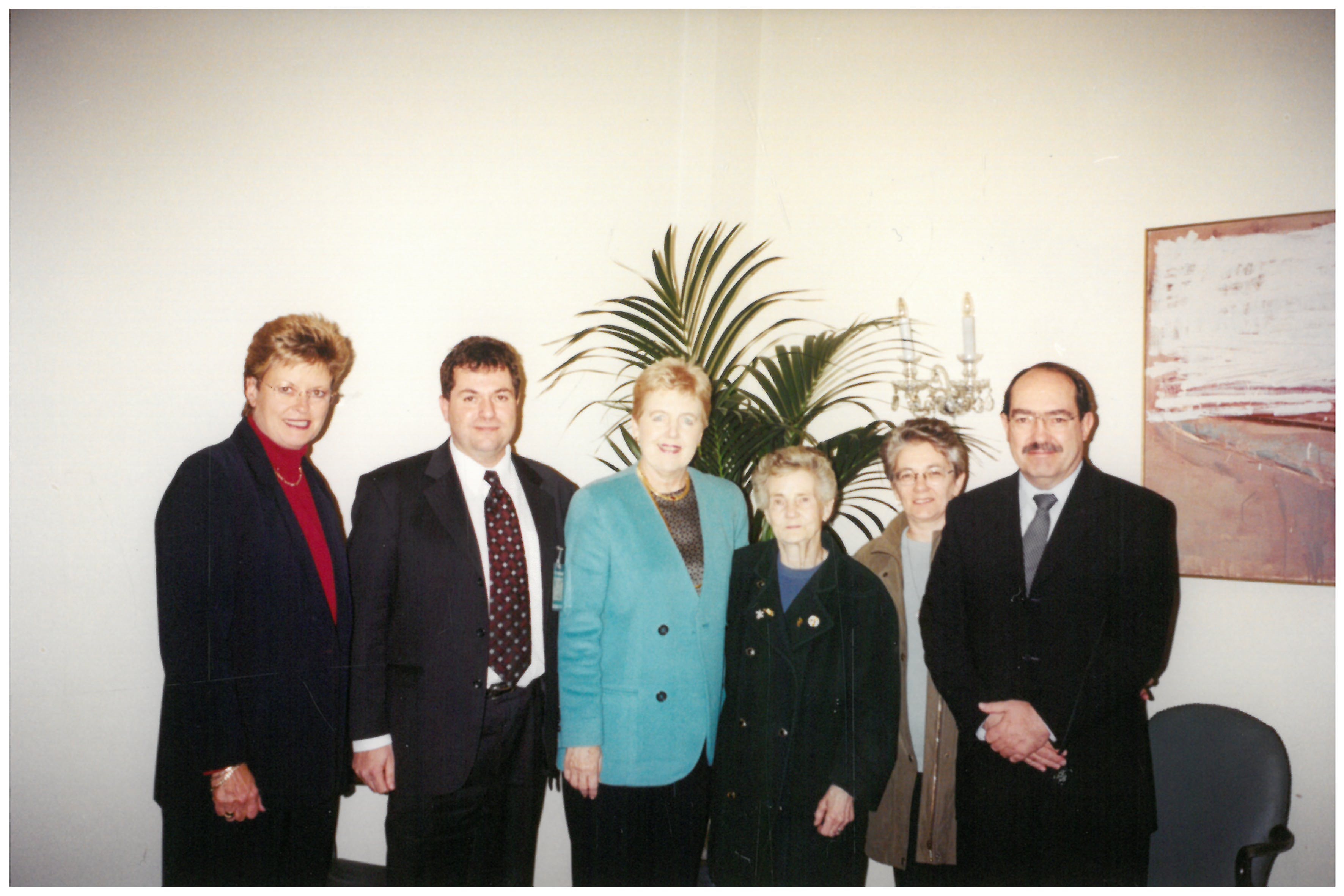 Committee members meeting with Rose and Sylvia Coulson, the mother and sister of child migrants who were all reunited under the travel scheme, 20 April 2001. L-R: Senator Sue Knowles [Deputy Chair], Ian Thwaites [Senior Social Worker, Child Migrants Trust], Senator Rosemary Crowley [Delegation Leader; Chair], Rose Coulson, Sylvia Coulson and Senator Andrew Murray.