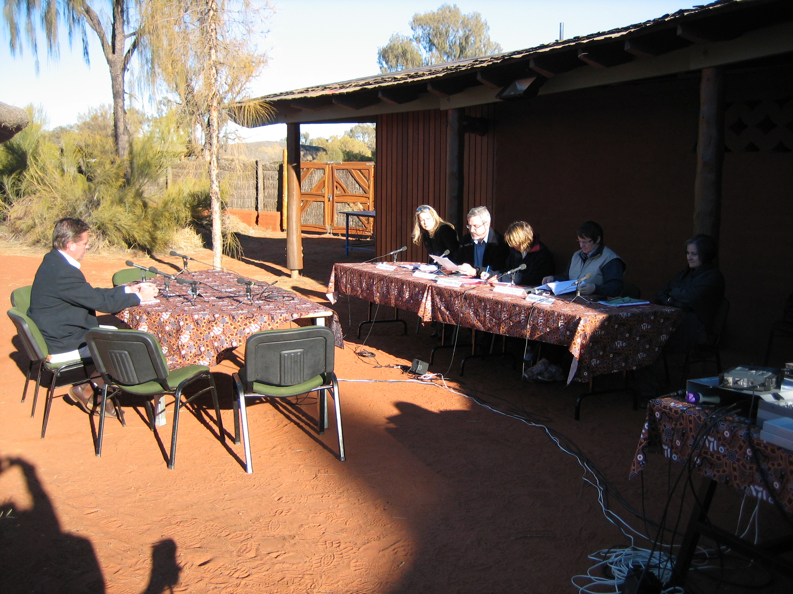 Committee members hearing evidence from Gareth Boyte, General Manager of Voyages Hotels and Resorts, 28 June 2006. Seated on right, L-R: Senators Dana Wortley and Andrew Bartlett [Chair], Dr Jacqueline Dewar [Acting Secretary], Senators Judith Adams [Deputy Chair] and Claire Moore.
