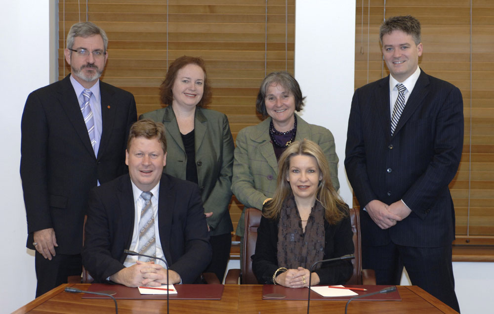 Members of the Standing Committee on Regulations and Ordinances, 26 June 2008. Standing L-R: Senators Andrew Bartlett, Carol Brown, Claire Moore and Mathias Cormann. Seated L-R: Senators Michael Ronaldson and Dana Wortley [Chair]. DPS Auspic.