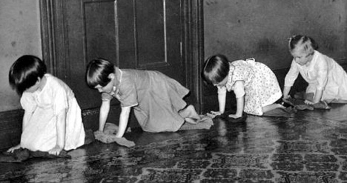 Four girls polishing the floor at Havilah Little Children’s Home, Wahroonga, NSW