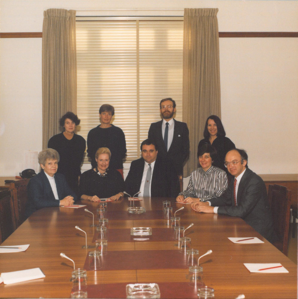 Standing Committee on Regulations and Ordinances, 1988. Standing L-R: Ann Millar [Research Officer], Jan Martin [Typist], Peter O’Keeffe [Secretary] and Helen Reid [Parliamentary Officer to Committee]. Seated L-R: Senators Patricia Giles, Bronwyn Bishop, Bob Collins [Chair], Kay Patterson and Bob McMullan.