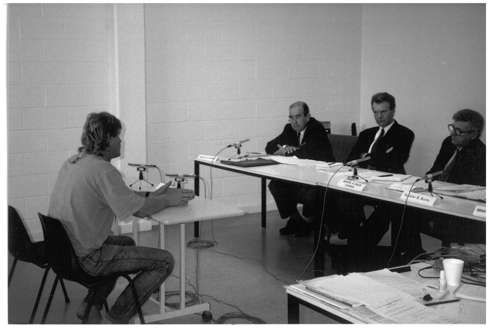 Standing Committee on Industry, Science, Technology, Transport, Communications and Infrastructure hearing evidence at a public hearing of its inquiry into fisheries legislation at Lakes Entrance, 21 April 1993. L-R: Witness Brian Bolding [President, Small Fishing Boat Operators Association], Senator Brian Archer, Robert Diamond [Secretary] and Senator Bruce Childs [Chair].