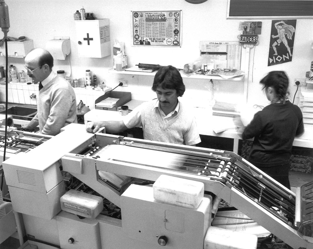 Senate printing press, 1983. L-R: Yan Kattewski, George Kuleas and Doris Gremk.