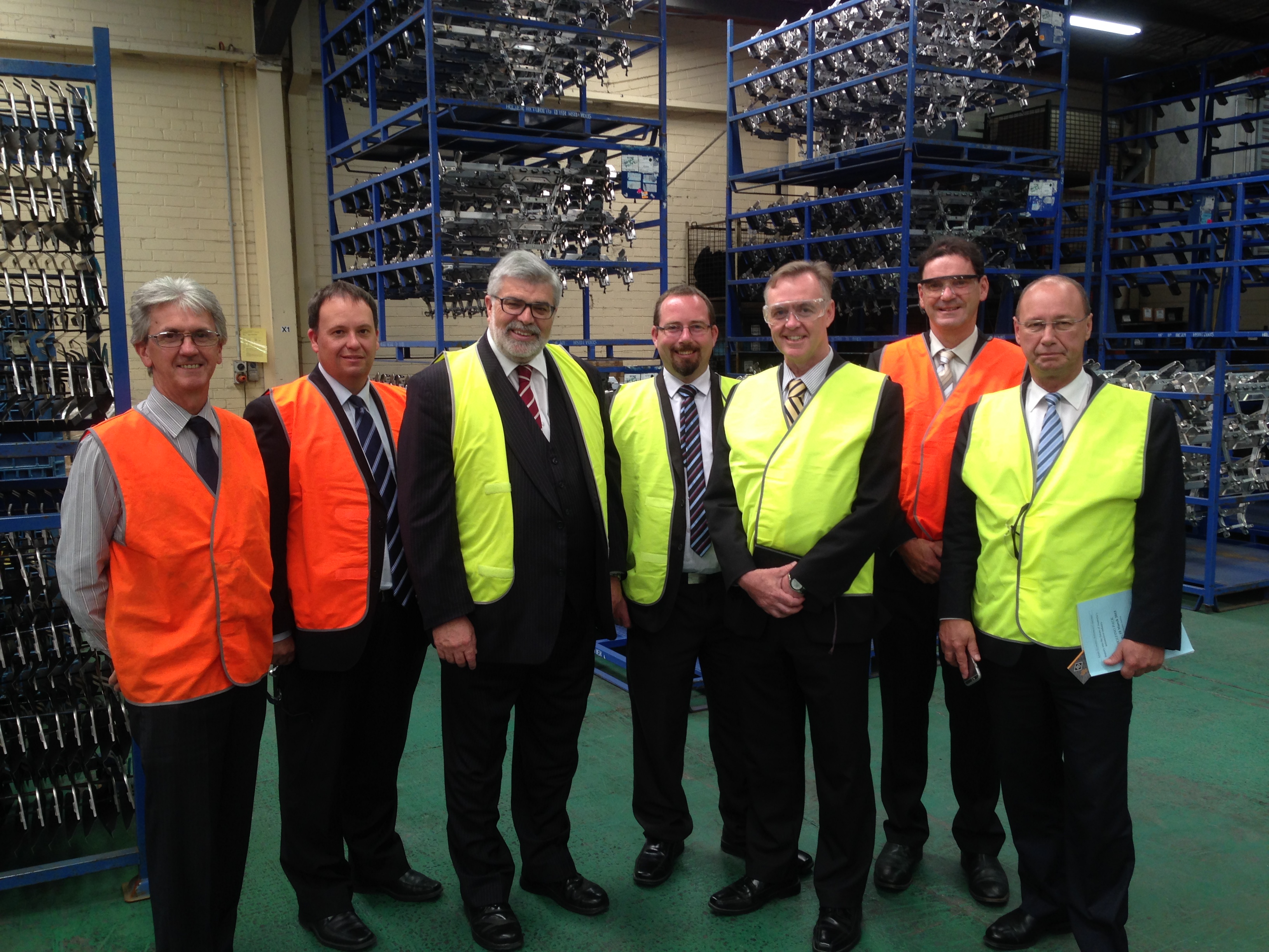 Site visit to Consolidated Industries, Reservoir, Vic, 10 March 2015. In yellow, L-R: Senators Kim Carr, Ricky Muir, Chris Ketter [Chair] and Sean Edwards [Deputy Chair].