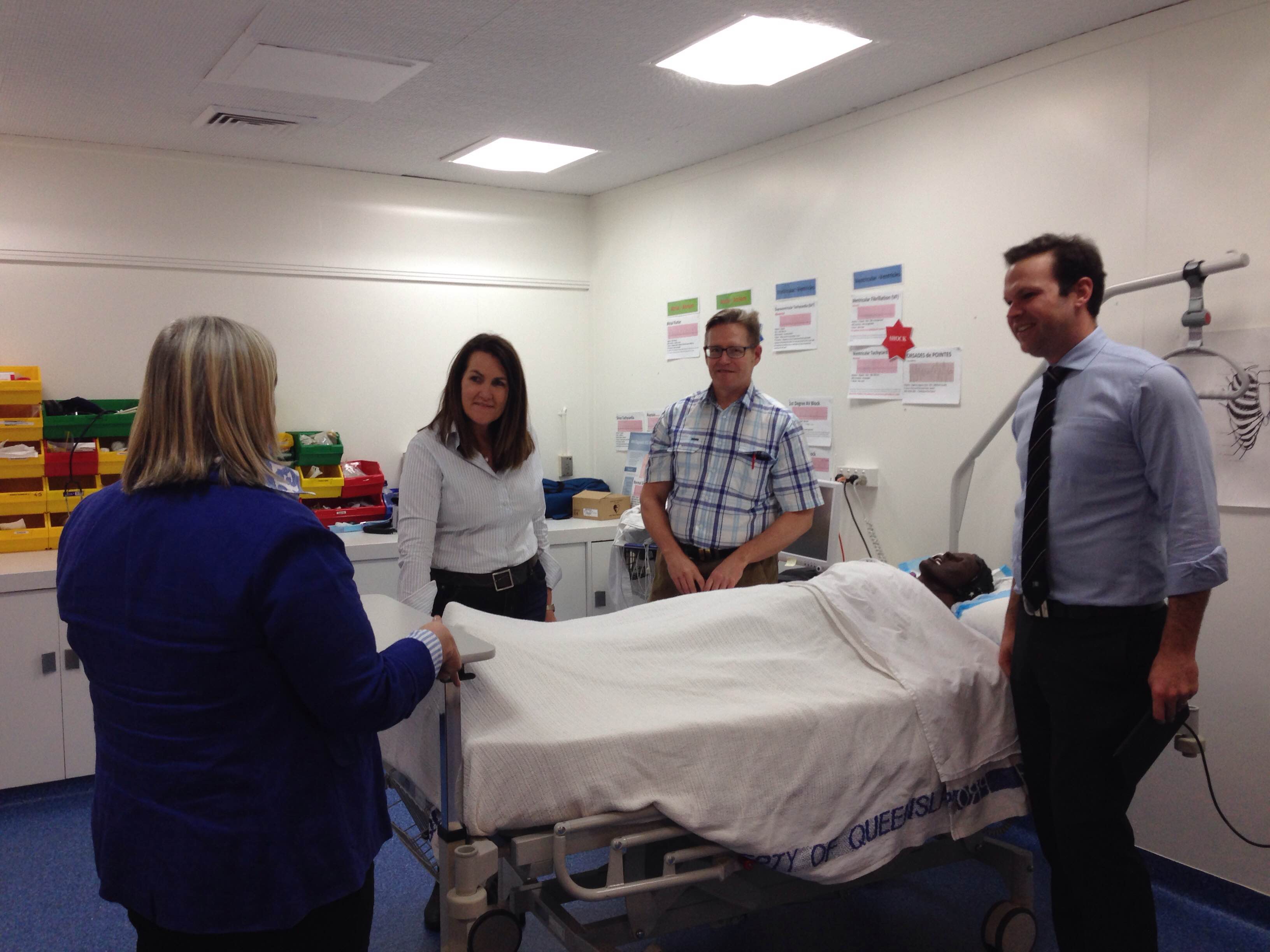 Committee members hearing about the training facilities for medical students in rural placements at Flinders Medical Centre, Cloncurry, Qld, 1 May 2015. Facing camera L-R: Senator Deborah O'Neill [Chair], Dr Bryan Connor and Senator Matt Canavan.