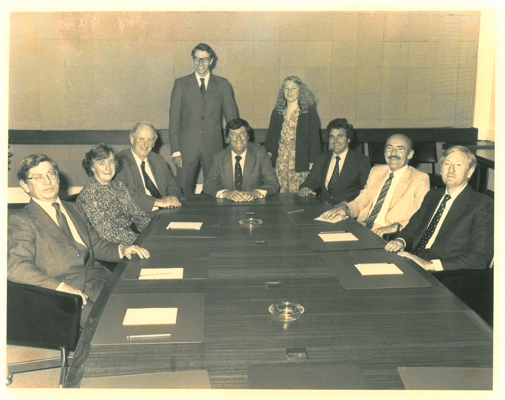 Standing Committee on Science and the Environment, 1981. Standing L-R: Cleaver Elliott [Research Officer] and Sue Thomson [Research Officer]. Seated L-R: Senators Colin Mason, Jean Melzer, Tony Mulvihill and Don Jessop [Chair], Peter Roberts [Secretary], Senators Michael Townley and David MacGibbon.