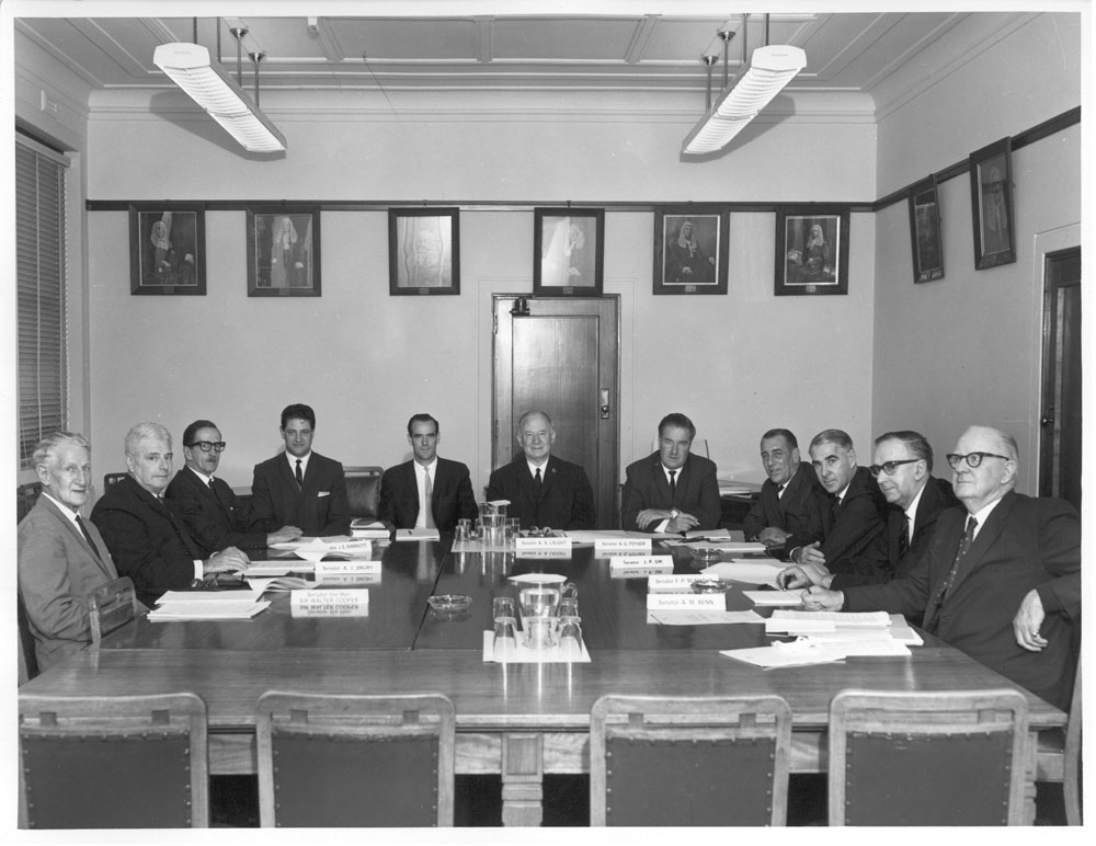 Select Committee on the Metric System of Weights and Measures, 29 April 1968. L-R: Senators Walter Cooper, Arnold Drury, John Marriott [Deputy Chair], Reg Jennings [Assistant Clerk; Deputy Usher of the Black Rod], Bert Nicholls [Clerk of the Committee; Usher of the Black Rod], Keith Laught [Chair], Alan Harper [Technical Consultant], George Poyser, Peter Sim, Frank McManus and Archie Benn.