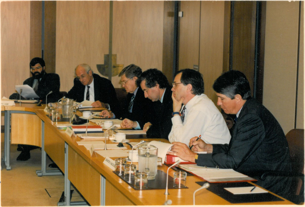 Foreign Affairs, Defence and Trade References Committee  at a public hearing of its inquiry into Australia's relations with the People's Republic of China, 1994. L-R: Senators Kim Carr, Bryant Burns and Gerry Jones, Paul Barsdell [Secretary], Senators Bob Woods [Chair] and Sandy Macdonald.