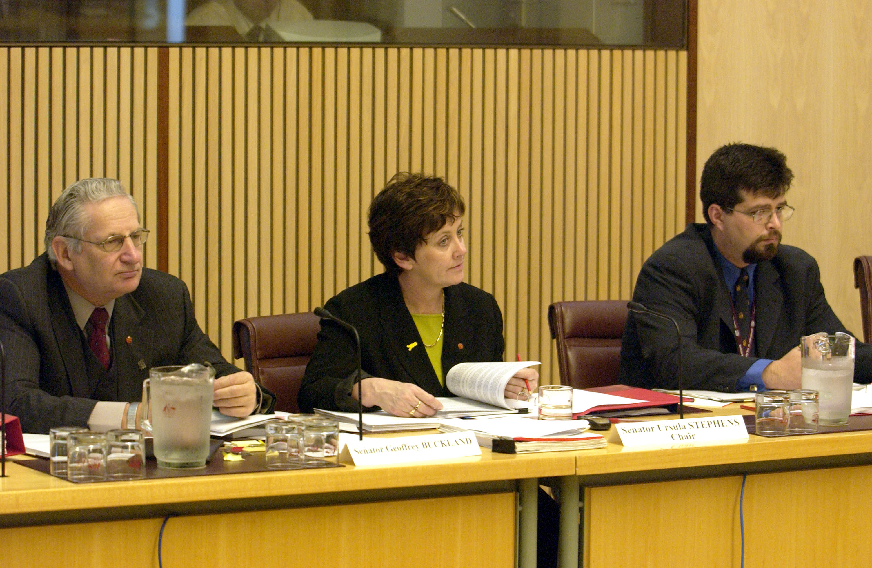 Economics References Committee at a public hearing of its inquiry into the effectiveness of the Trade Practices Act 1974 in protecting small business, 17 October 2003. L-R: Senators Geoff Buckland and Ursula Stephens [Chair], Dr Anthony Marinac [Acting Secretary]. DPS Auspic.