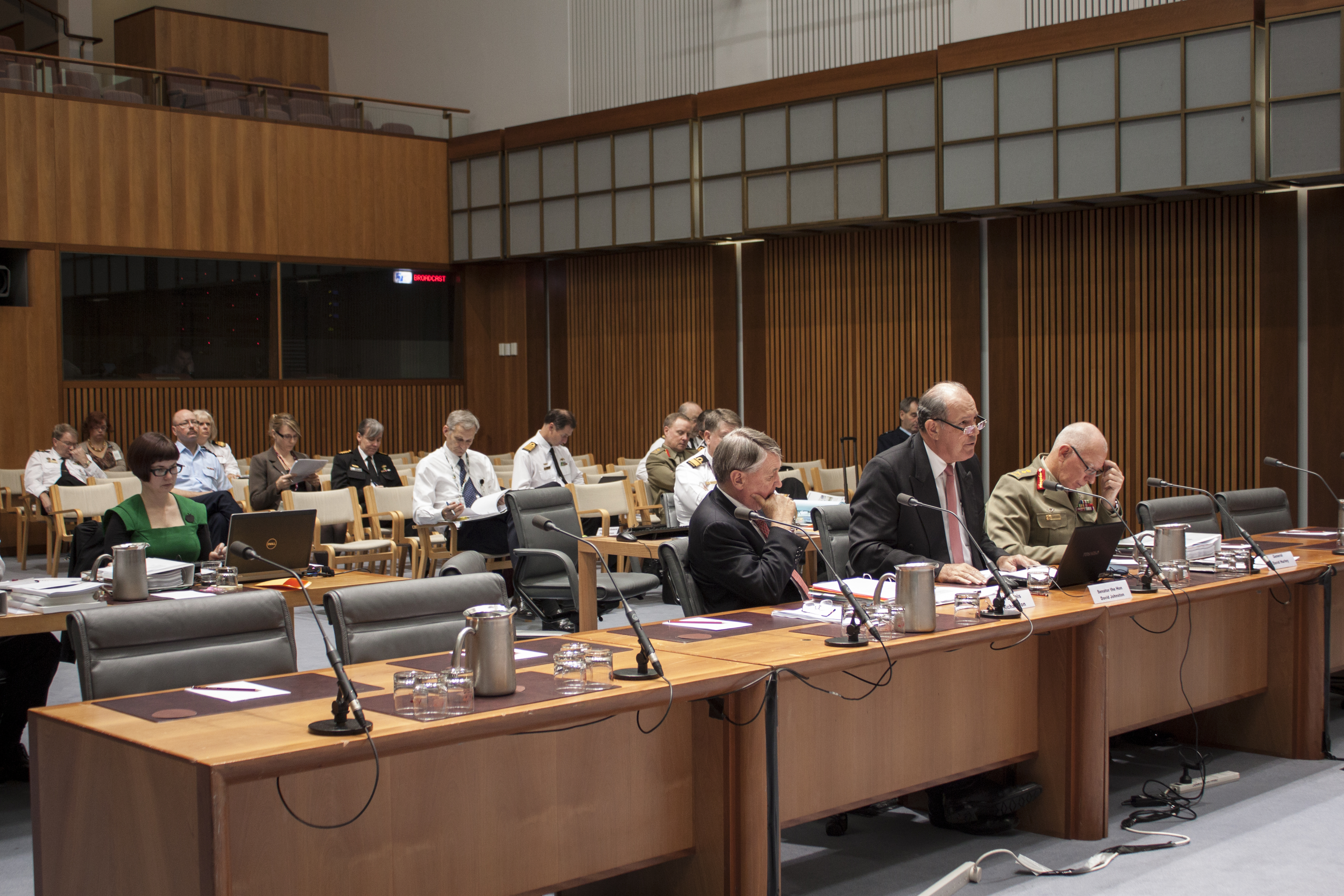 Senator David Johnston, Minister for Defence, at a Foreign Affairs, Defence and Trade Legislation Committee budget estimates hearing, 2 June 2014. Seated at witness table L-R: Dennis Richardson [Secretary, Department of Defence], Senator the Hon David Johnston [Minister for Defence] and General David Hurley [Chief of the Defence Force].