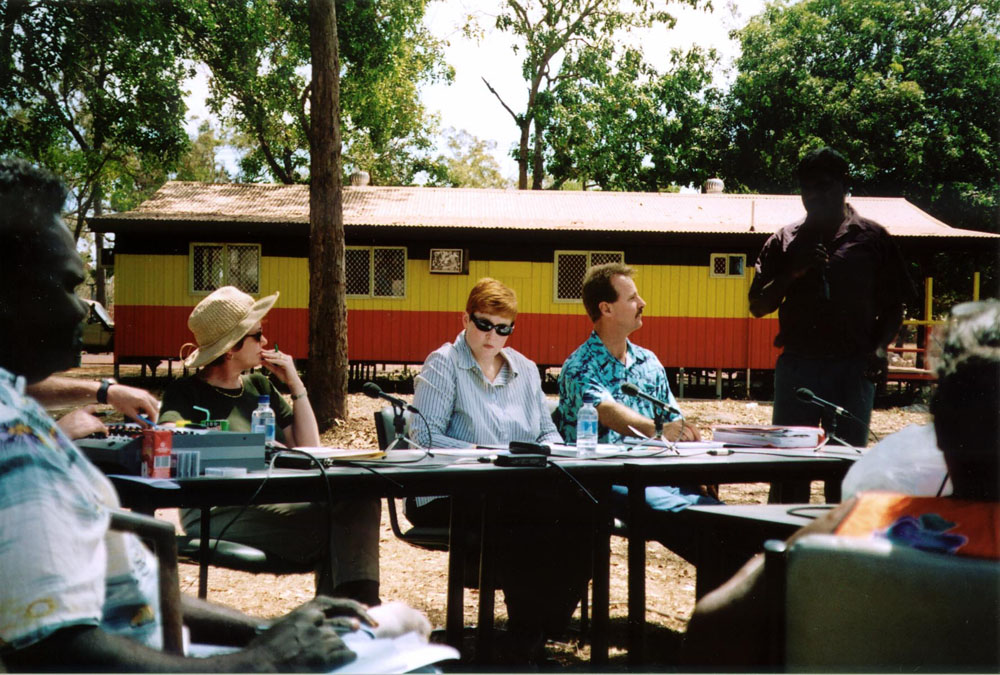 Members of the Legal and Constitutional References Committee hearing evidence and answering questions from witnesses from the Galiwin'ku community of Elcho Island at the 11 September 2002 public hearing of the inquiry into the Migration Legislation Amendment (Further Border Protection Measures) Bill 2002 excising additional territory from the Australian migration zone. Seated at table L-R: Senators Ursula Stephens, Marise Payne [Acting Chair] and Nigel Scullion.