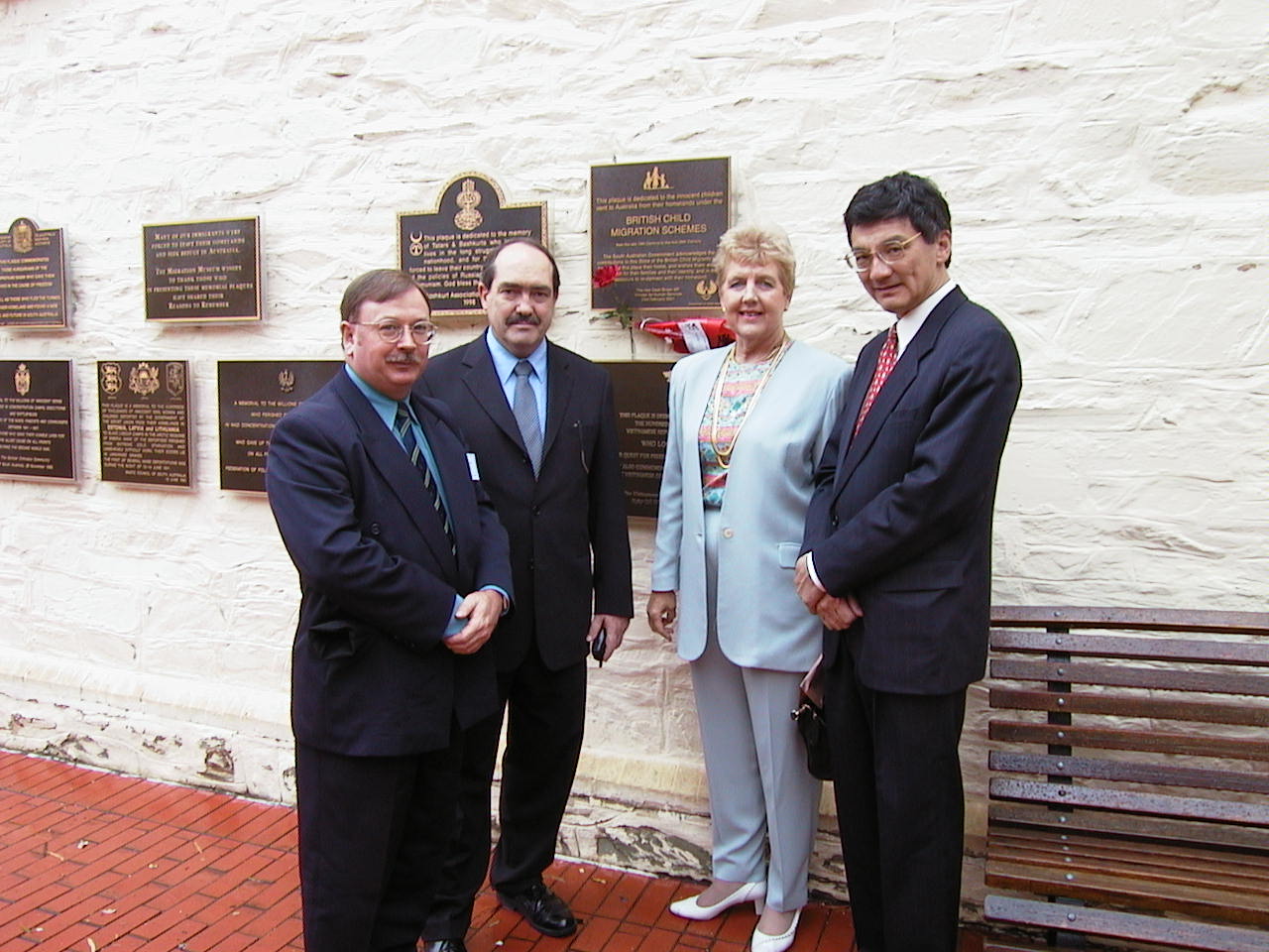 Community Affairs References Committee viewing a plaque commemorating British child migrants at the South Australian Migration Museum, Adelaide, 16 March 2001. L-R: Elton Humphery [Secretary], Senators Andrew Murray, Rosemary Crowley [Chair] and Tsebin Tchen.