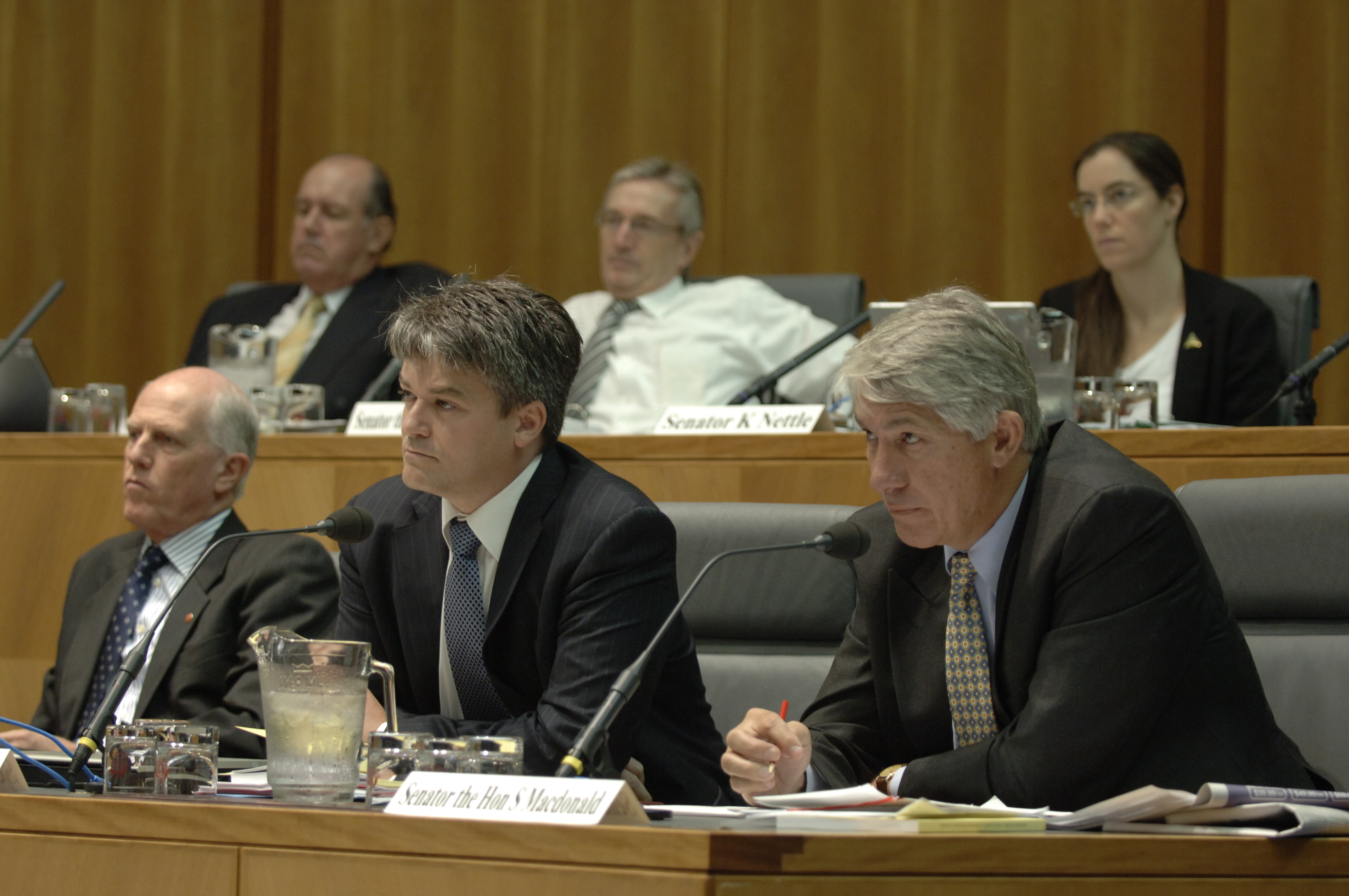 Standing Committee on Foreign Affairs, Defence and Trade at an additional estimates hearing, 20 February 2008. Top row L-R: Senators David Johnston, Nick Minchin and Kerry Nettle. Bottom row L-R: Senators Russell Trood [Deputy Chair], Mathias Cormann and Sandy Macdonald. DPS Auspic.