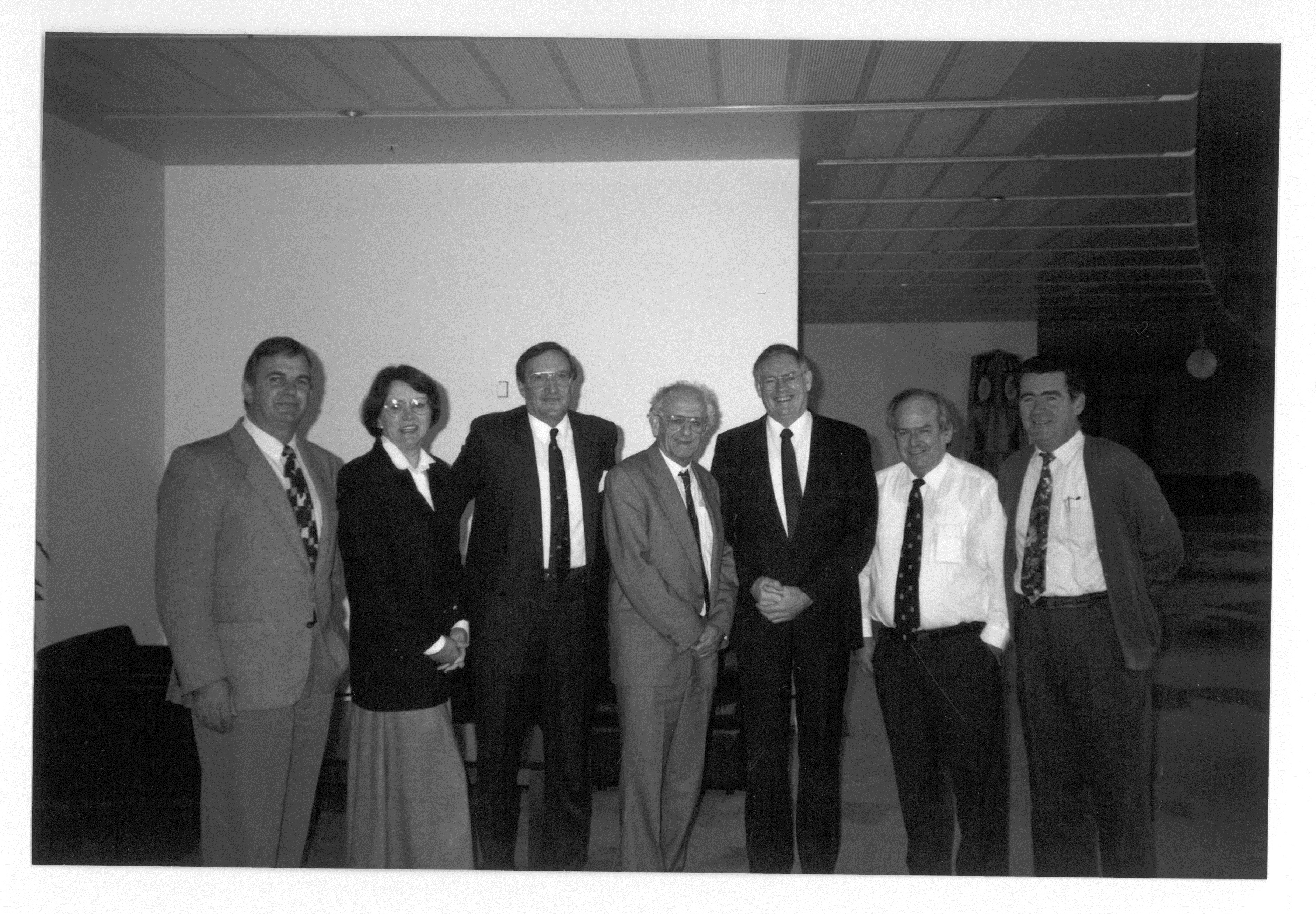 Ted Woodfield, New Zealand's High Commissioner to Australia, with members of the Standing Committee on Rural and Regional Affairs after appearing before a public hearing of its shearing industry employment inquiry, 11 June 1993. L-R: Senators Paul Calvert, Sue West, David Brownhill [Deputy Chair] and Bryant Burns [Chair], High Commissioner Ted Woodfield, Senators Winston Crane and Jim McKiernan.