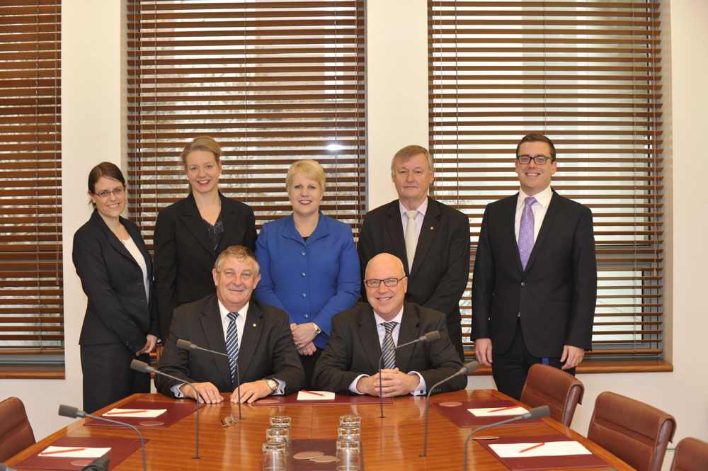 Members and staff of the Standing Committees on Education, Employment and Workplace Relations (Legislation and References), 18 June 2013. Standing L-R: Bonnie Allan [Principal Research Officer], Senators Bridget McKenzie, Catryna Bilyk and Alex Gallacher, and Tim Watling [Secretary]. Seated L-R: Senators Chris Back [Deputy Chair, Legislation] and Gavin Marshall [Chair, Legislation]. DPS Auspic.