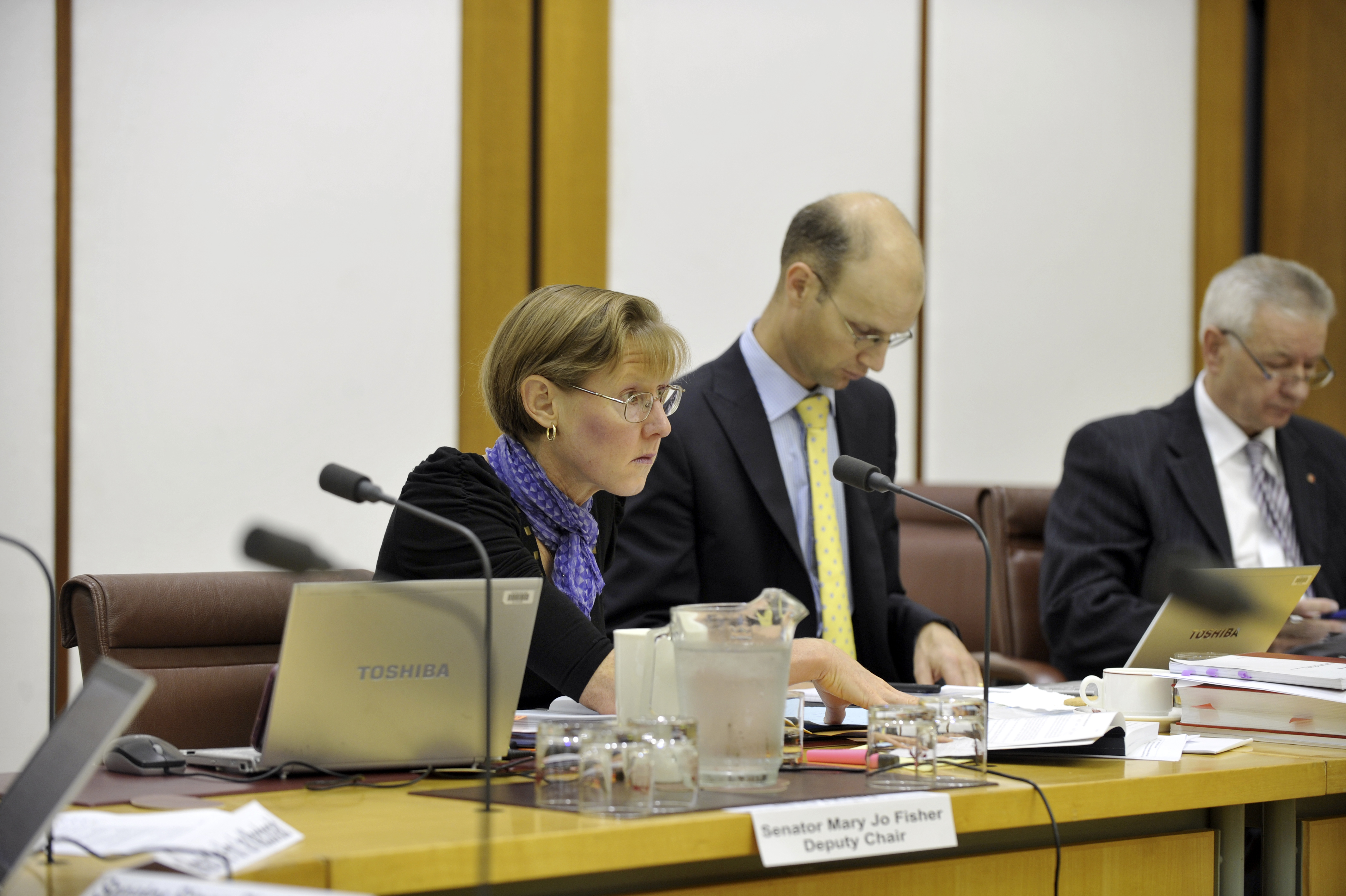 Senator Mary Jo Fisher, deputy chair of the Senate Environment and Communications Legislation Committee (left), questioning officers from the Department of Broadband, Communications and the Digital Economy during a budget estimates hearing, 26 May 2011. DPS Auspic.