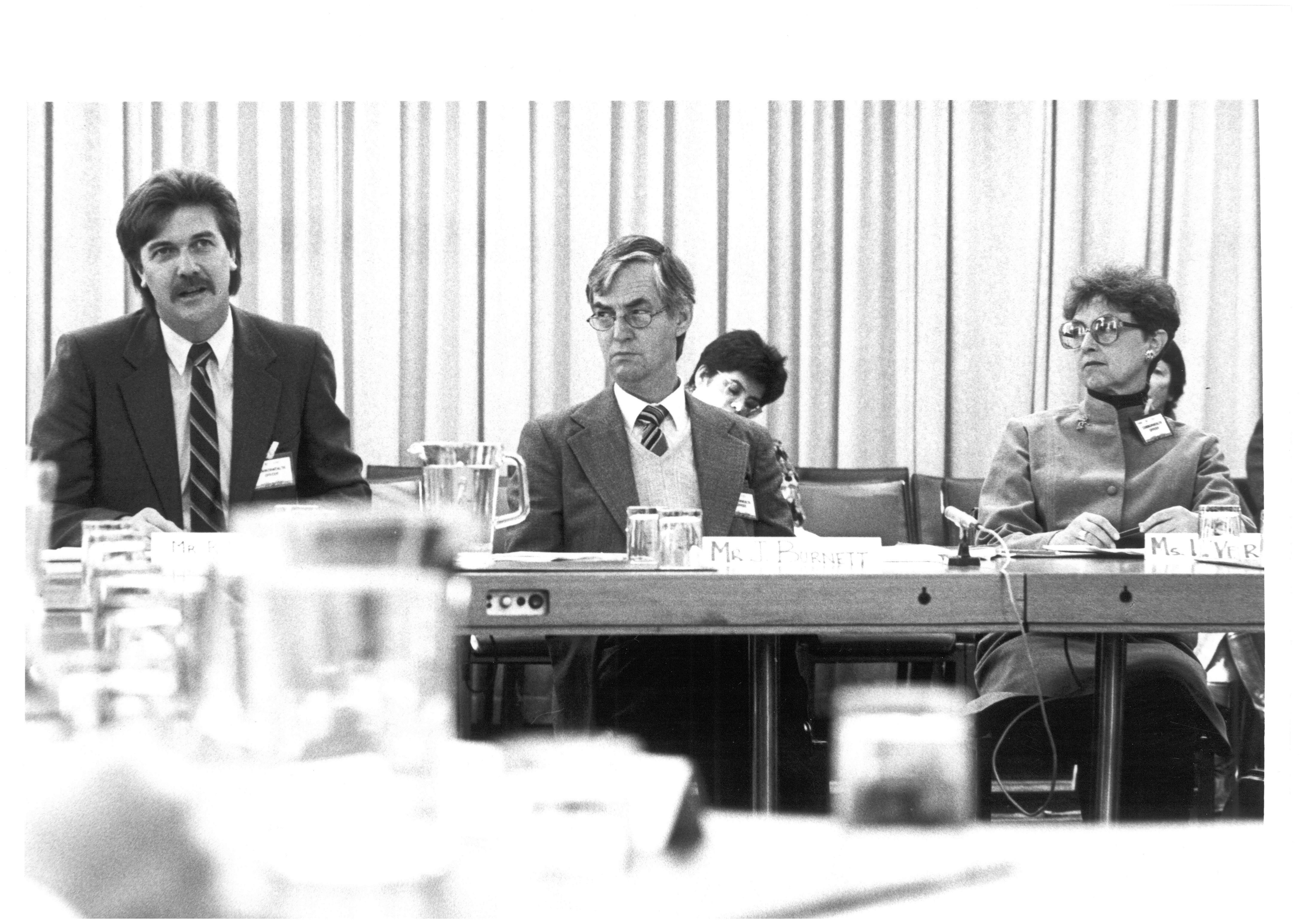 Officers from the Department of Education and Commonwealth Schools Commission appearing before the Standing Committee on Education and the Arts, 14 July 1986. L-R: Witnesses Ross Harris, John Burnett and Lois Verrall.