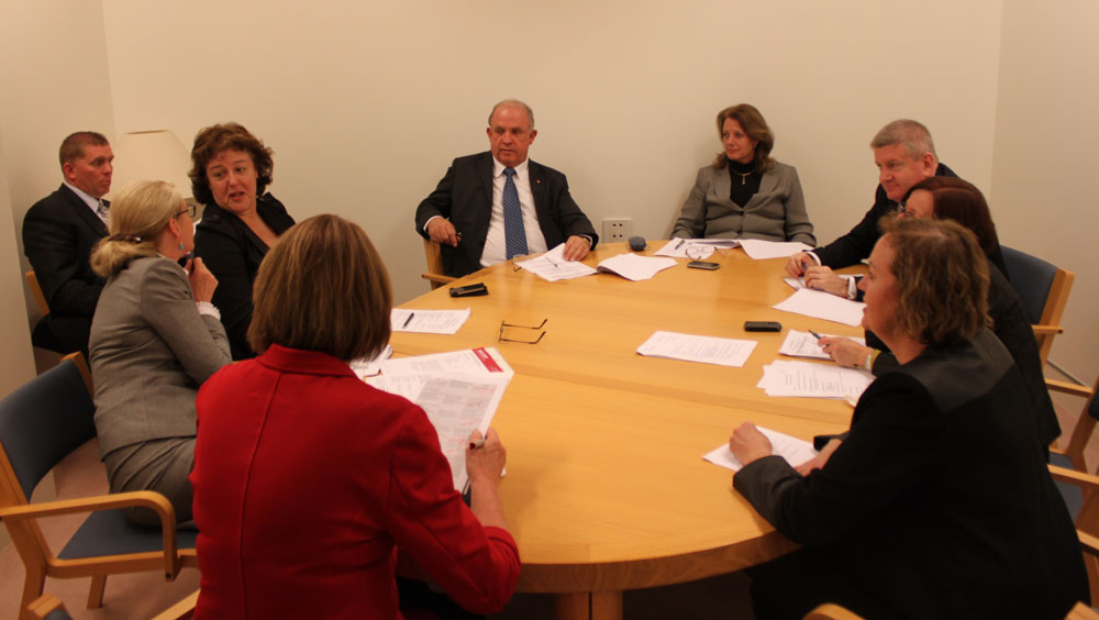 The Selection of Bills Committee in June 2013. Clockwise around table from top: Senators Helen Kroger [Opposition Whip], Mitch Fifield, Rachel Siewert [Australian Greens Whip] (obscured), Carol Brown and Anne McEwen [Chair; Government Whip] (back to camera), Maureen Weeks [Secretary], Senators Jacinta Collins and John Williams [The Nationals Whip].