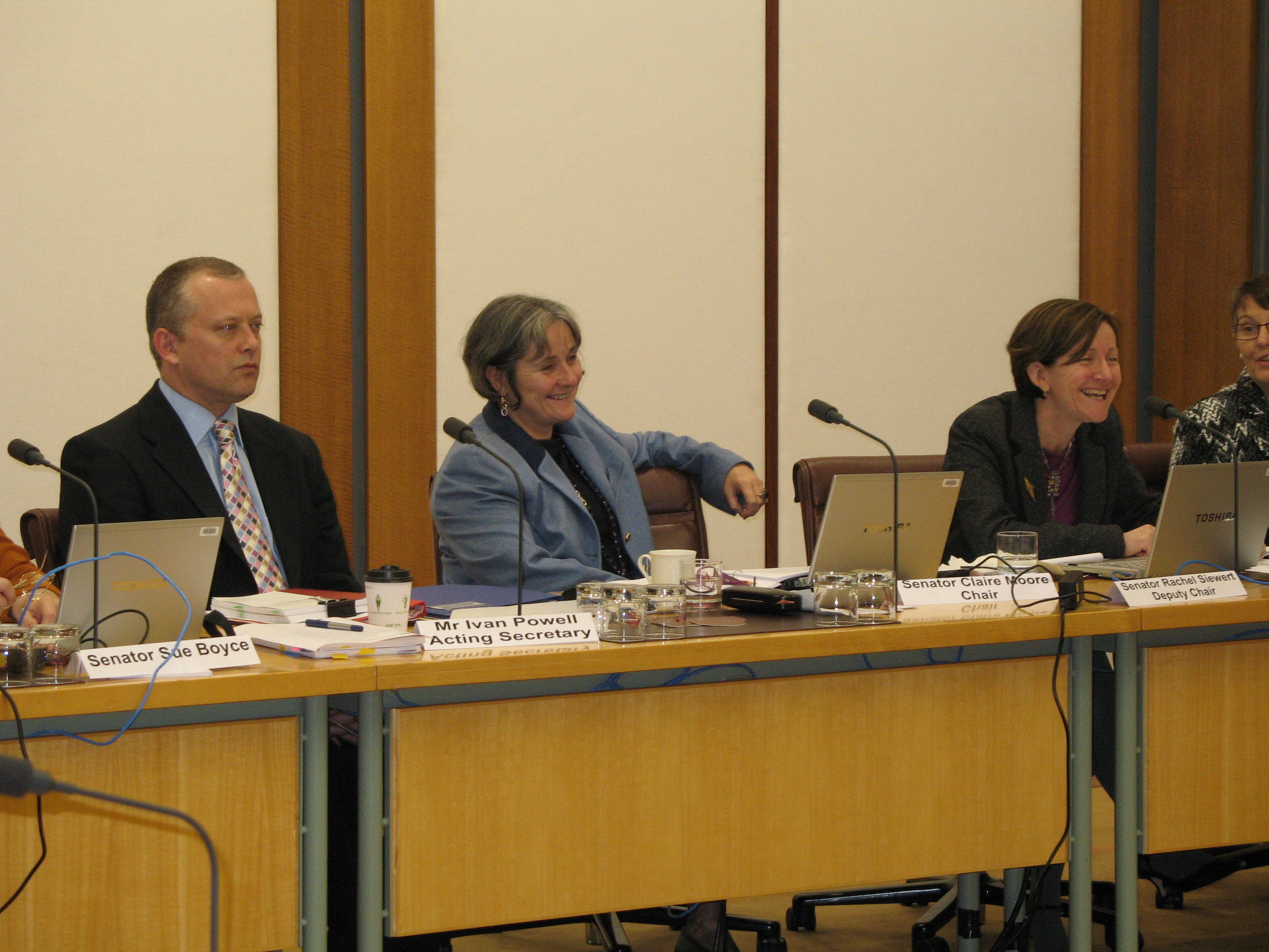 Community Affairs Legislation Committee hearing evidence from witnesses, 6 August 2009. L-R: Ivan Powell [Acting Secretary], Senators Claire Moore [Chair] and Rachel Siewert [Deputy Chair]. DPS Auspic.