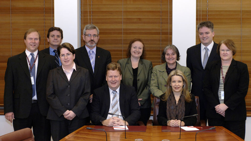 Members and staff of the Standing Committee on Regulations and Ordinances, 26 June 2008. Standing L-R: James Warmenhoven [Secretary], Professor Stephen Bottomley [Legal Adviser], Sarah Bannerman [Research Officer], Senators Andrew Bartlett, Carol Brown, Claire Moore and Mathias Cormann, and Janice Paull [Research Officer]. Seated L-R: Senators Michael Ronaldson and Dana Wortley [Chair]. DPS Auspic.