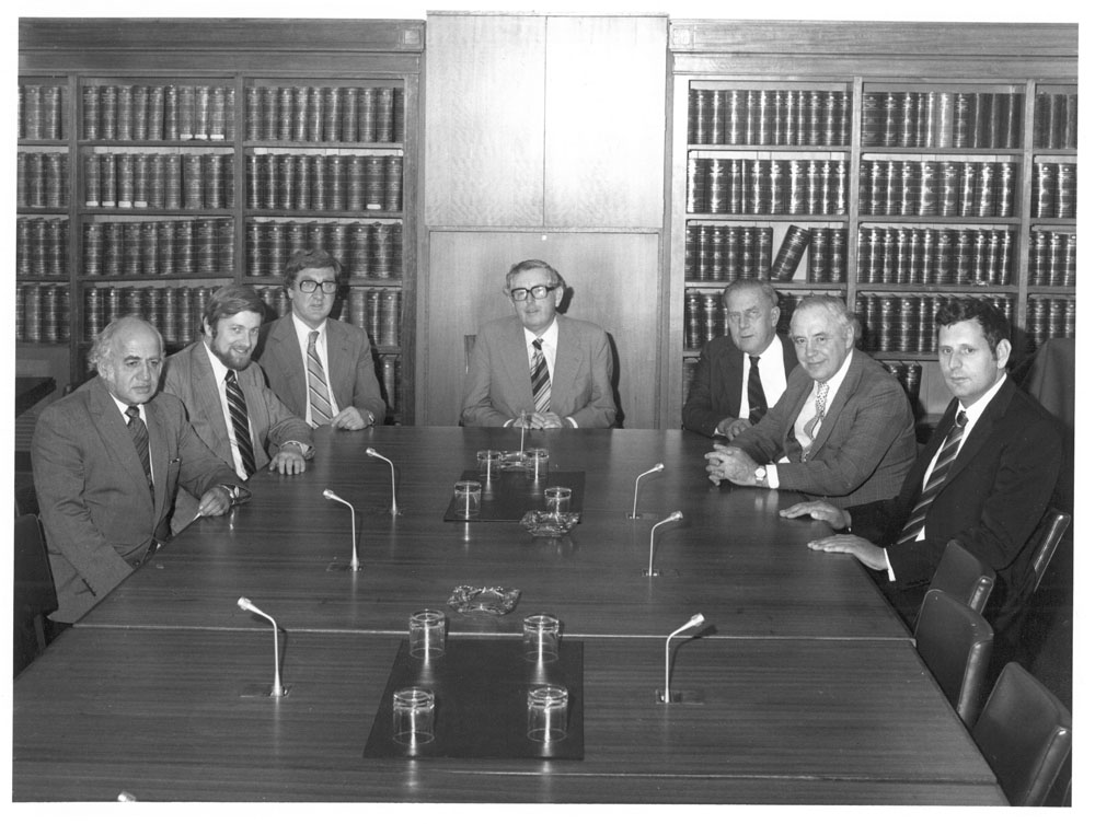 Standing Committee on Regulations and Ordinances, 14 May 1980. L-R: Senators George Georges, Gareth Evans, Austin Lewis, Alan Missen [Chair], Jim Cavanagh and David Hamer, and Harry Evans [Secretary]. NAA: A6180,  14/5/80/68.