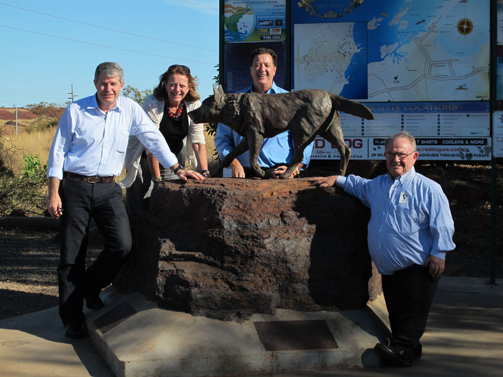 Senators David Fawcett, Helen Kroger, Mark Bishop and Alan Eggleston of the Foreign Affairs, Defence and Trade References Committee posing with a statue of Red Dog during a visit to the Pilbara region as part of the committee's Indian Ocean rim inquiry, 23 April 2013.