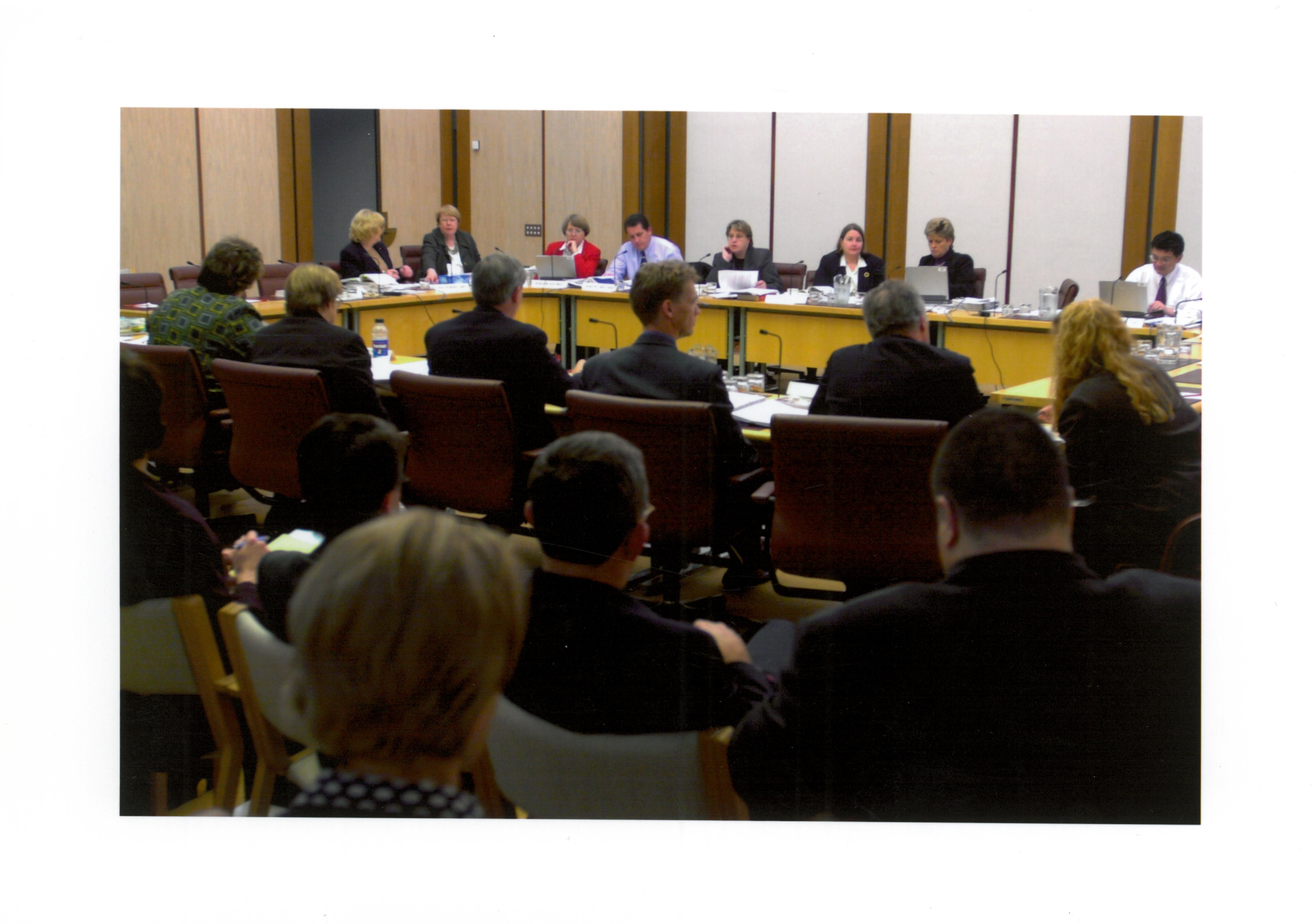 Community Affairs Legislation Committee questioning officers from the Department of Health and Aged Care at a budget estimates hearing, 28 May 2001. Seated facing camera L-R: Senators Brenda Gibbs, Kay Denman, Sue West, Chris Evans and Trish Crossin, Christine McDonald [Acting Secretary], Senators Sue Knowles [Chair] and Tsebin Tchen.